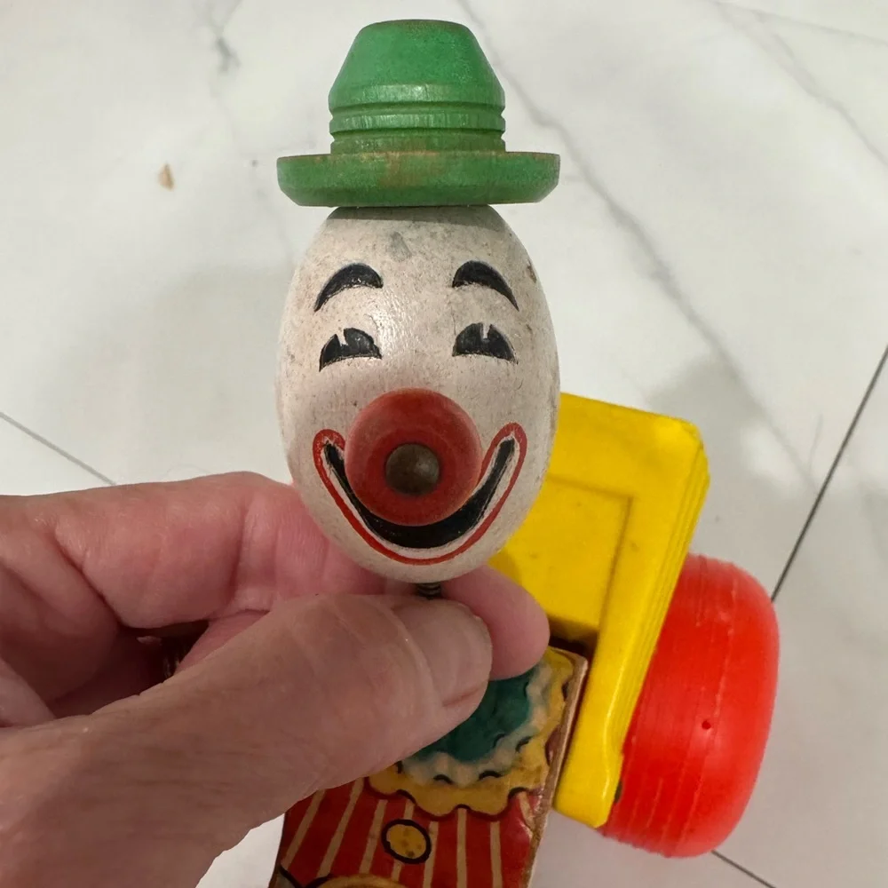 Vintage Fisher Price Jolly Jallopy pull toy from 1974.